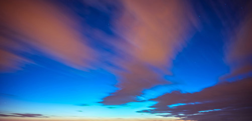 Fototapeta na wymiar Sunset sunrise with clouds. Long exposure.