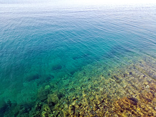 Clear turquoise coast in Croatia, sea horizon image. Beautiful summer sea view.