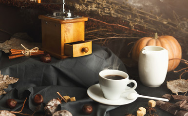 Coffee cup and sweets on vintage wooden table