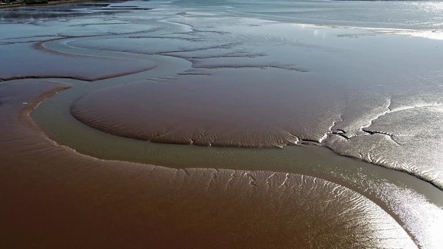 Flying over the tideland in Conwy area in north wales