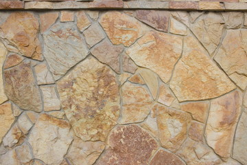 Stones wall background texture. Surface natural color 