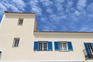 Fototapeta na wymiar Blue window and blue sky