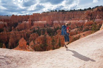 Hiker visits Bryce canyon National park in Utah, USA