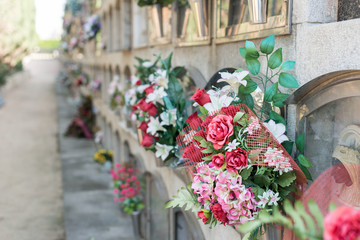 Obraz na płótnie Canvas Flowers in a cemetery