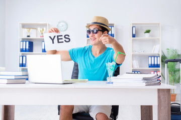 Businessman holding message in office