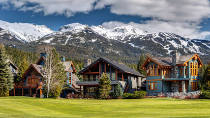 Luxury Homes on Nicklaus North Golf Course in Whistler on a sunny Spring day with Blackcomb...