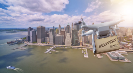 Drone flying with package over lower Manhatten, New York City