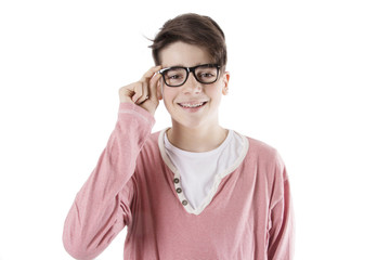 Fototapeta premium teenager with glasses and fashion braces on the white wall