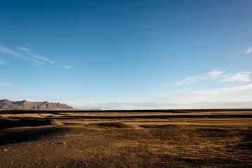Scenic landscape of mountains in Iceland, field