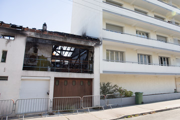 Fototapeta na wymiar Damaged building house after an accidental fire