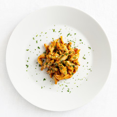 fried marinated with orange juice seafood decorated with cilantro