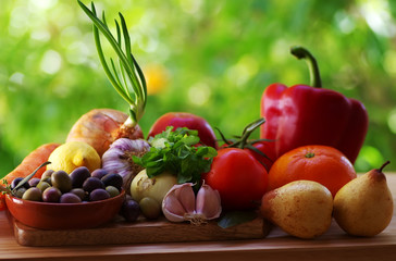Naklejka na ściany i meble Fresh fruits and vegetables on table