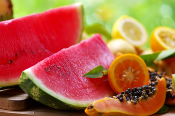 sliced papaya, watermelon and ripe frui