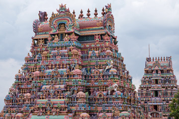 Two of the 21 entrance gateways, or Gopuram, at the Ranganathaswamy temple at Trichy in Tamil Nadu, India. The state is renowned for its temples   and for the local fashion for painting the gateways 