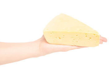 A piece of cheese in a hand