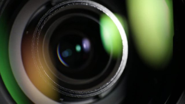 Camera lens close up shot. Zoom in, zoom out