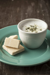 Cup of coffee with matcha tea
