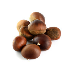 Castanea sativa. Pile of sweet chestnut in shell isolated on white background.