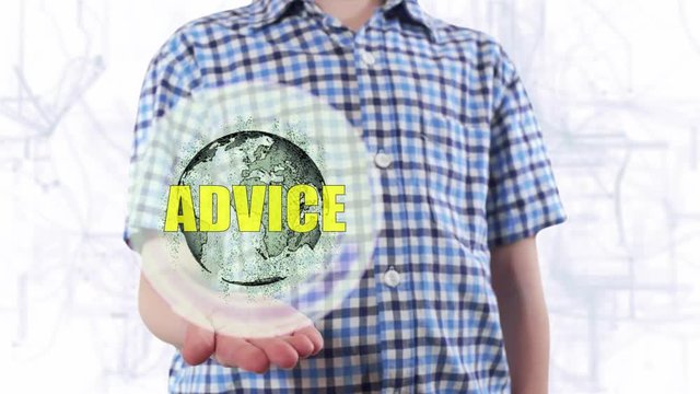 Young man shows a hologram of the planet Earth and text Advice. Boy with future technology 3d projection on a modern white digital background