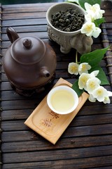 Healthy oolong tea cup with leaves