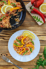 Spanish paella on a white plate