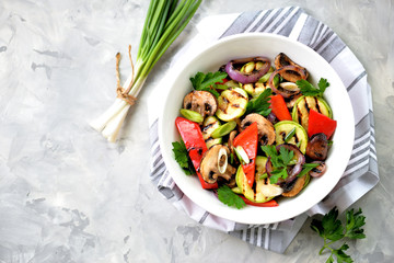 Grilled vegetables - zucchini, portobello mushrooms, red pepper, red onion, green onion, garlic, olive oil, wine vinegar, sea salt and parsley. Healthy food.