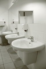 Naklejka na ściany i meble washing basins in a public area