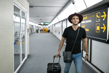 Fototapeta na wymiar Young guy in airport