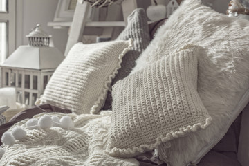 Close up on a knitted pillows