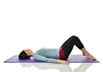 Mother woman exercising doing postnatal workout. Female fitness instructor stretching hands and...