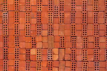 texture of a red brick stacked as a background