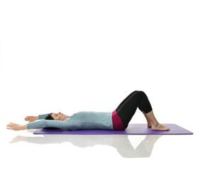 Mother woman exercising doing postnatal workout. Female fitness instructor stretching hands and...