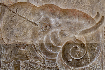 Elephant head bas-relief in Bayon temple, Siem Reap, Cambodia. Artistic bas-relief with war elephant.