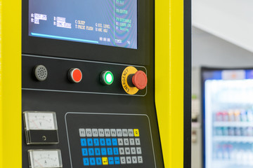 Detail of CNC machine control panel.