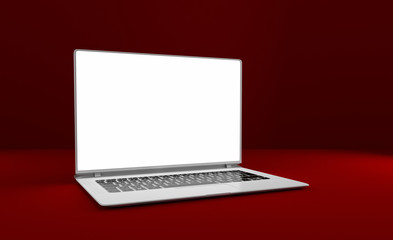 Mackup laptop on a red table. Isolated. 3D illustration.