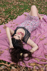 Naklejka premium Gorgeous young latina relaxing in the park