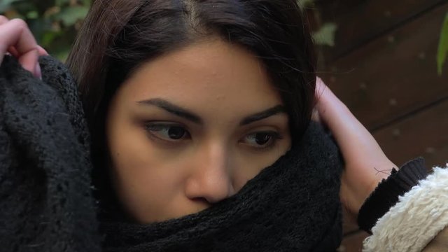 close up portrait of Young pretty asian womanl wearing scarf