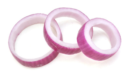 Sliced red onion on white background