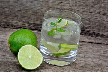 Water with fresh lime in a glass