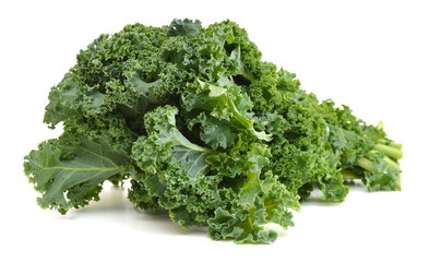 Obraz premium freshly harvested kale cabbage on a white background