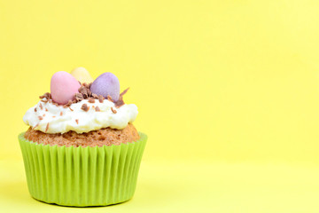 Easter cupcake with chocolate eggs