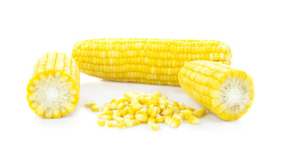 Sweet whole kernel corn and ears of corn on white background.
