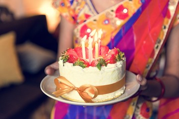 Indian family celebrating a birthday party