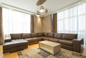 Interior of a modern open plan hotel apartment, living room