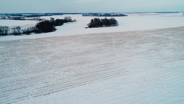 flight over filds in winter
