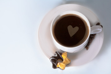 Coffee cup and beans on old kitchen table. Top view with copyspa