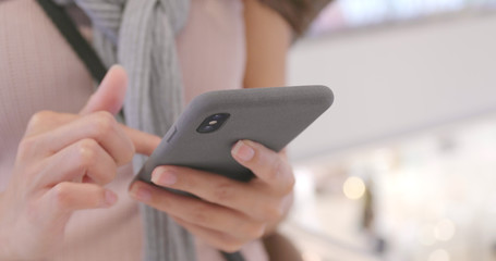 Using mobile phone in shopping mall