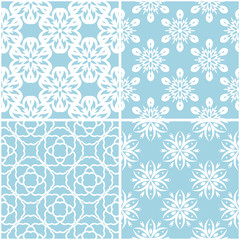 Fototapeta na wymiar Floral patterns. Set of blue and white seamless backgrounds