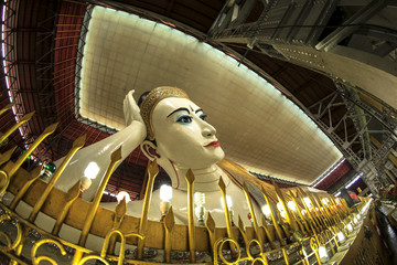 The little known Chaukhtatgyi Temple in Myanmar capital city Yangon has one of the biggest and most graceful Reclining Buddha statues in South East Asia © Jeffery