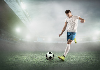 Soccer player on a football field in dynamic action at summer da